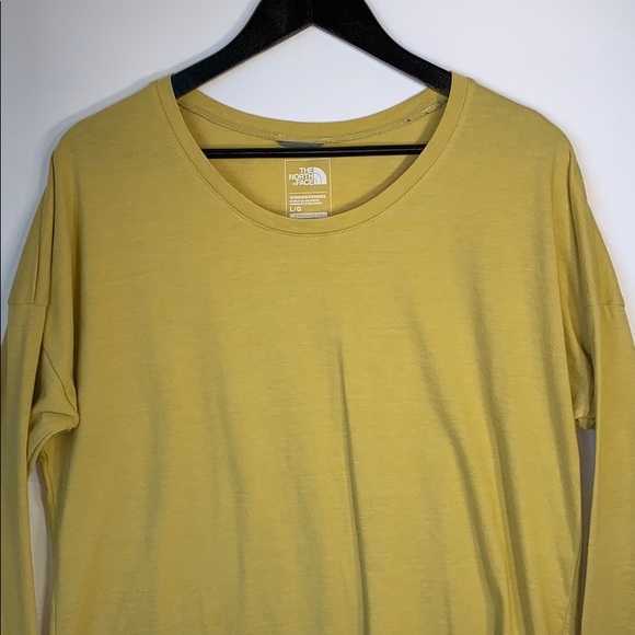 mustard colored long sleeve shirt